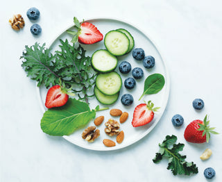 Plate with fruits and vegetables