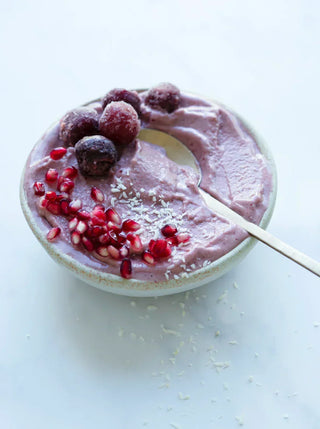 a bowl filled with cherry and bright bowl smoothie