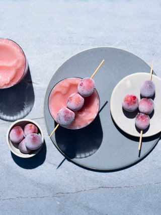 2 glasses of froze mocktail with frozen grapes