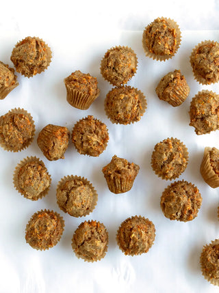 a batch of warm glow pulp muffins on a tray