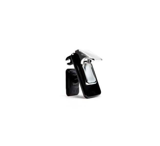 A black and silver handheld stapler with its top open, isolated on a white background—reminiscent of the sleek design found in products like the Juice Cap.
