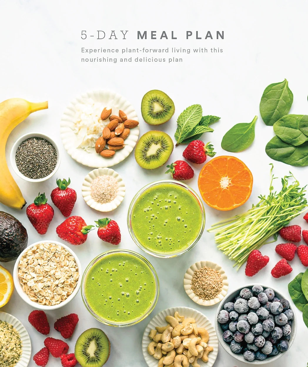 Flat lay of fruits, nuts, seeds, spinach, oats, and two green smoothies on a white background with text saying 5-Day Meal Plan and a short description about plant-forward living.