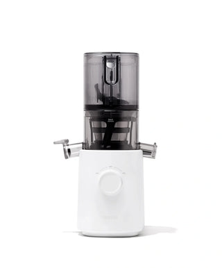 A modern white and gray juicer with a transparent top section, dual spouts on either side, and a central dial on the front.