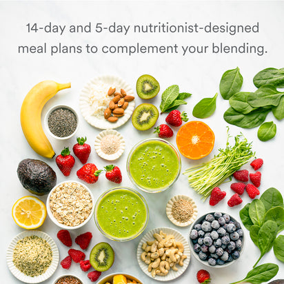 An assortment of fresh fruits, leafy greens, nuts, seeds, and two green smoothies on a white surface. Text above reads: 14-day and 5-day science-based meal plans from Blending for Beginners to complement your blending.