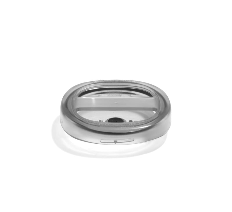 Chamber Lid with a sliding closure and a drinking hole, designed for the Nama M1 Plant-Based Milk Maker. The clear plastic, oval-shaped lid features two bars across the top and is displayed against a white background, casting a soft shadow below.