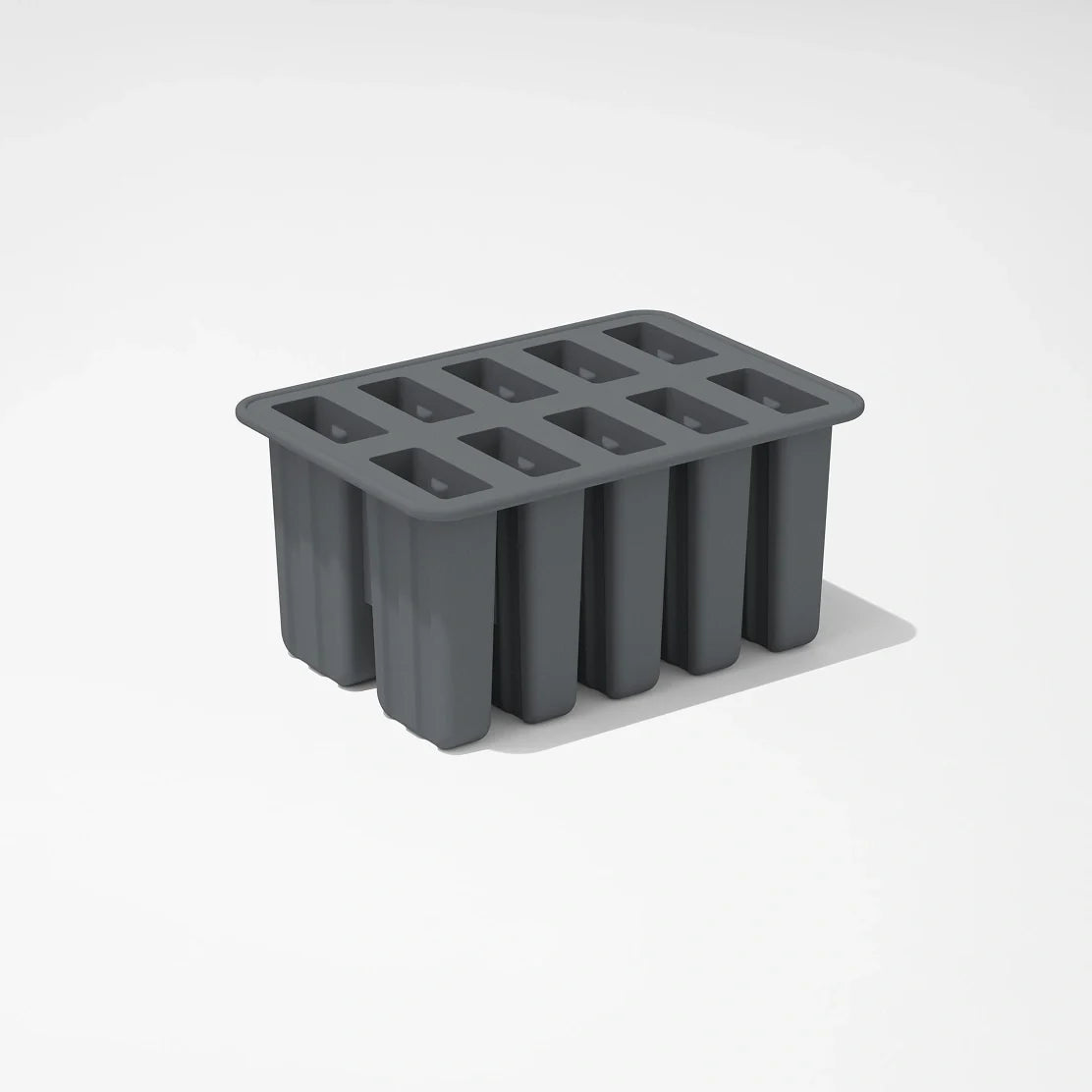 The Nama Popsicle Mold is a dark gray silicone tray with ten rectangular compartments, shown on a plain white surface.