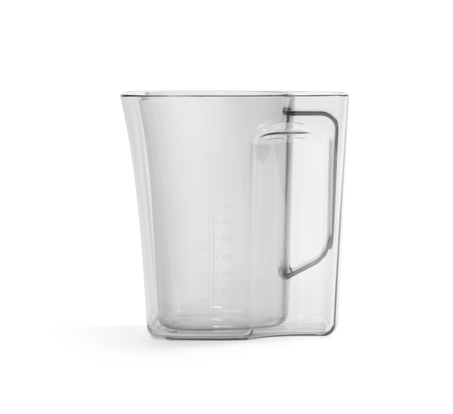 The Juice and Pulp Container Set, featuring a transparent measuring cup with a handle and marked measurement lines, designed for use with the Nama C2 cold press juicer, is shown on a white background.