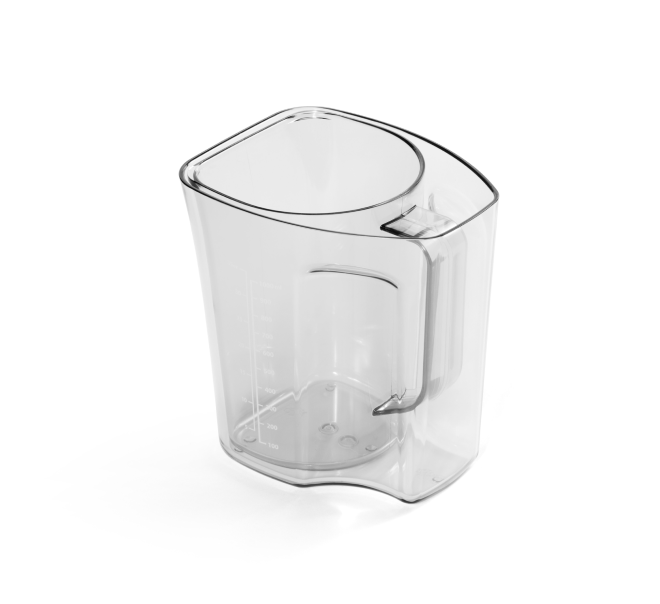 The Juice and Pulp Container Set includes a clear plastic measuring cup with a handle and easy-to-read volume markings on the side. Perfect for use with your cold press juicer or as a juice and pulp container for the Nama C2, the empty cup is shown on a white background, angled from above.