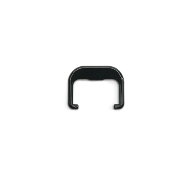 A small, black Pulp Outlet Loop—U-shaped and made of plastic or metal, with a flat top and two short, outward-facing prongs—is centered on a white background.