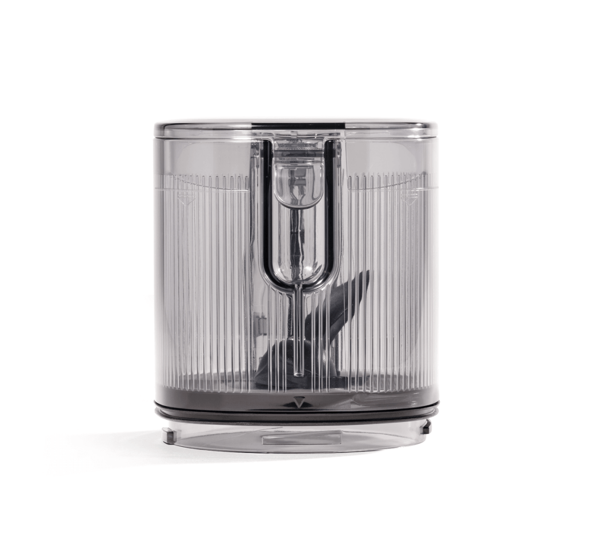 The Hopper Assembly is a transparent plastic container with a ribbed design and a central blade mechanism at the base, designed for chopping or blending, and is compatible with the Nama J3 Cold Press Juicer; shown against a plain white background.