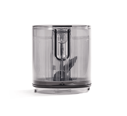 The Hopper Assembly is a clear plastic part with vertical ridges and sharp internal blades, designed for use with a Nama J3 cold press juicer or food processor, displayed on a white background.
