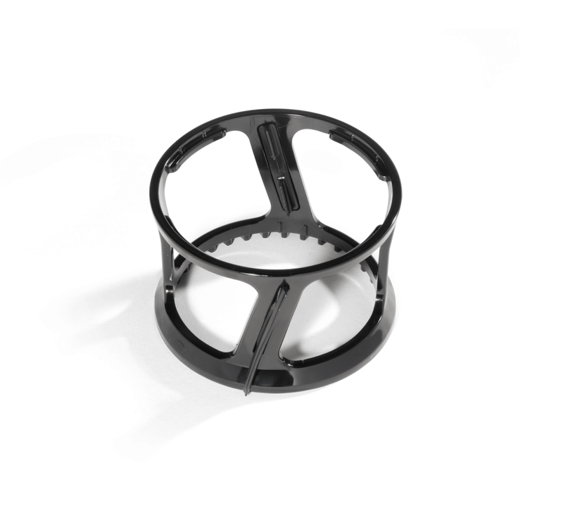 A black plastic circular holder with open sides and vertical supports, designed to hold components such as the Spinning Brush, placed on a white background.