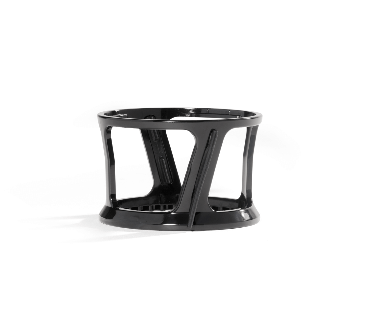 A black, cylindrical plastic stand with open sides and a sturdy base, designed to hold the Spinning Brush, photographed on a white background.