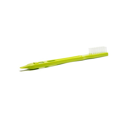 A green Cleaning Brush with white bristles lies horizontally on a white background, featuring a flat, ergonomic handle and a pointed end opposite the bristles.