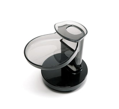 The Hopper is a modern black and transparent spiral slide for small pets like hamsters or mice, with a round base and raised circular platform entry—its sleek curves inspired by the Nama Vitality 5800 juicer lid.